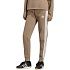 Dámské kalhoty adidas Essentials 3-Stripes Fleece Slim, béžové, KF8317